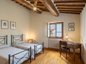 Posteľ alebo postele v izbe v ubytovaní Holiday Home Casale il Giglio-1 by Interhome