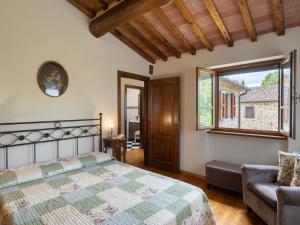 Posteľ alebo postele v izbe v ubytovaní Holiday Home Casale il Giglio-1 by Interhome