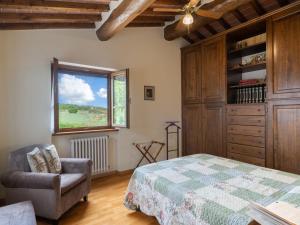 Posteľ alebo postele v izbe v ubytovaní Holiday Home Casale il Giglio-1 by Interhome