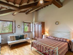 Posteľ alebo postele v izbe v ubytovaní Holiday Home Casale il Giglio-1 by Interhome