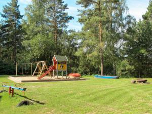 a park with a playground with a slide at Holiday Home Lenzer Höh-2 by Interhome in Lenz