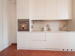 Kuchyňa alebo kuchynka v ubytovaní Apartment Capo d'Arco-2 by Interhome