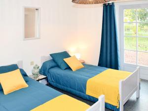 Lova arba lovos apgyvendinimo įstaigoje Holiday Home Les Mailloches - REE100 by Interhome