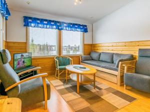 Posezení v ubytování Holiday Home Rukan seitakallio 1- siula by Interhome