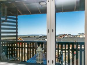 a view from the balcony of a building at Holiday Home Ruka ski chalets 64- 1503 by Interhome in Ruka