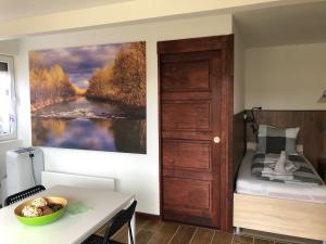 Kuchyň nebo kuchyňský kout v ubytování Citellus Apartman