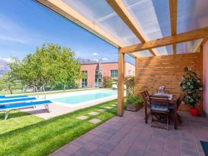 The swimming pool at or close to Holiday Home Gelsomini - CCO522 by Interhome