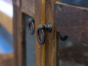 a close up of a wooden door with black hinges at Holiday Home Kivipirtti by Interhome in Keuruu
