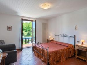 Postel nebo postele na pokoji v ubytování Holiday Home Podere Ritali by Interhome