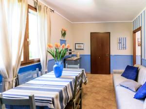 A seating area at Holiday Home Bilocale - Ranch Hotel by Interhome