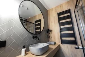 Kúpeľňa v ubytovaní Stylowe Apartamenty Plewiska