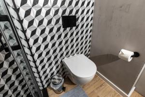 Kúpeľňa v ubytovaní Stylowe Apartamenty Plewiska