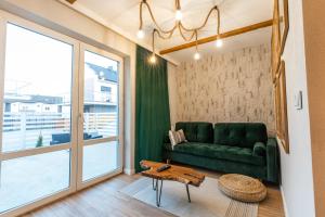 Posedenie v ubytovaní Stylowe Apartamenty Plewiska