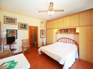 Voodi või voodid majutusasutuse Apartment La Tartana by Interhome toas