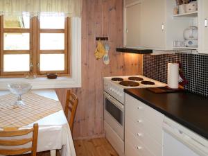 Kuchyň nebo kuchyňský kout v ubytování Holiday Home Rabbane - FJS504 by Interhome