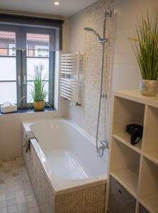 Koupelna v ubytování Swebenhus boven - FeWo mit großer Dachterrasse