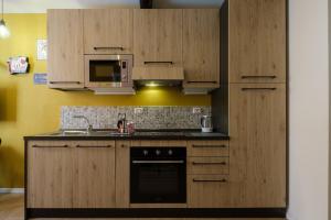 Kuchyňa alebo kuchynka v ubytovaní Casa del Sole by Studio Vita