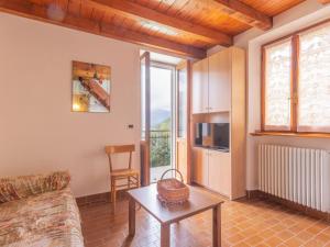 Televízia a/alebo spoločenská miestnosť v ubytovaní Holiday Home Casa Rina by Interhome + 31 fotografií