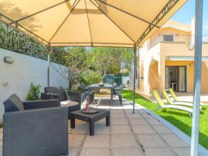 A seating area at Holiday Home Pellicano by Interhome