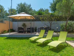 A garden outside Holiday Home Pellicano by Interhome