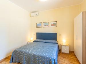 Posteľ alebo postele v izbe v ubytovaní Apartment Mare Blu-1 by Interhome + 11 fotografií