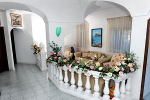 Posezení v ubytování Hotel La Ninfea