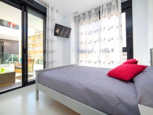 Postel nebo postele na pokoji v ubytování Apartment Calpe Beach II-1 by Interhome