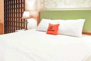 KoolKost at Bypass Jimbaran - Minimum Stay 30 Nights客房内的一张或多张床位