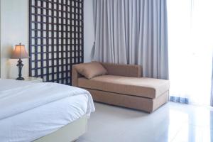 KoolKost at Bypass Jimbaran - Minimum Stay 30 Nights客房内的一张或多张床位