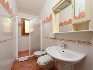 A bathroom at Villa Petra Rossa by Interhome