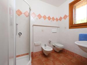 A bathroom at Villa Petra Rossa by Interhome