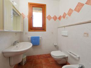 A bathroom at Villa Petra Rossa by Interhome