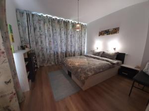 מיטה או מיטות בחדר ב-Къща за гости "Марковски"