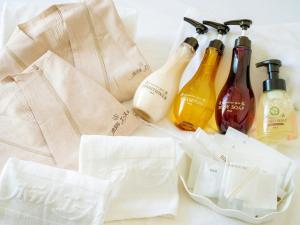a group of bottles of soap and paper bags at Hotel Ace Morioka in Morioka