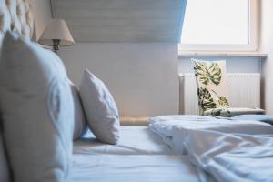 Postel nebo postele na pokoji v ubytování Hotel Kattenbeck
