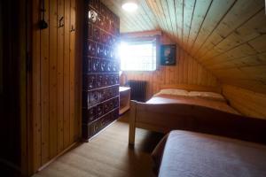 Postel nebo postele na pokoji v ubytování Cottage in the woods - Lake Bohinj