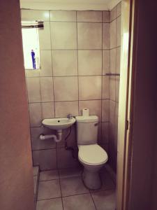 Kylpyhuone majoituspaikassa Rayon guesthouse