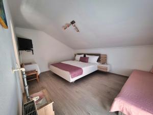 Postel nebo postele na pokoji v ubytování Gästehaus auf der Höhe