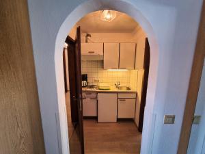 Kuchyň nebo kuchyňský kout v ubytování Gästehaus auf der Höhe