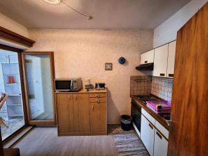 Kuchyň nebo kuchyňský kout v ubytování Gästehaus auf der Höhe