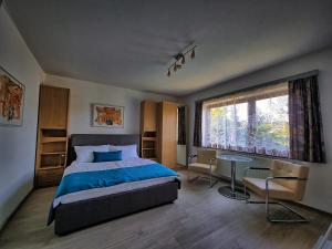 Postel nebo postele na pokoji v ubytování Gästehaus auf der Höhe