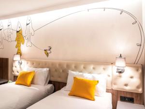 Posteľ alebo postele v izbe v ubytovaní ibis Styles Lublin Stare Miasto