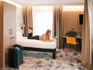 Posteľ alebo postele v izbe v ubytovaní ibis Styles Lublin Stare Miasto