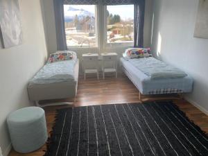 Postel nebo postele na pokoji v ubytování EIDE Gjestehus