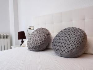 A bed or beds in a room at Apartamento Turístico Duero Niño