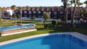 an image of a swimming pool at a resort at ALDEA DEL COTO in Chiclana de la Frontera