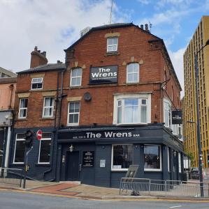 a building on the corner of a street at The Wrens in Leeds