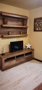 TV/trung tâm giải trí tại APARTAMENTO ALES