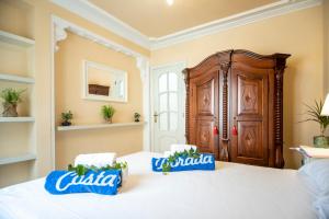 Postel nebo postele na pokoji v ubytování ARENDA Pino Alto Villa Lemon
