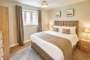 Llit o llits en una habitació de Host & Stay - Sunny Dale Cottage
